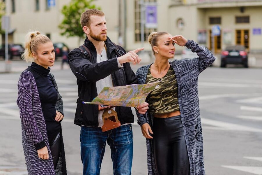 Aalborg: Express Walk with a Local in 60 minutes - Walking toward the House of Music