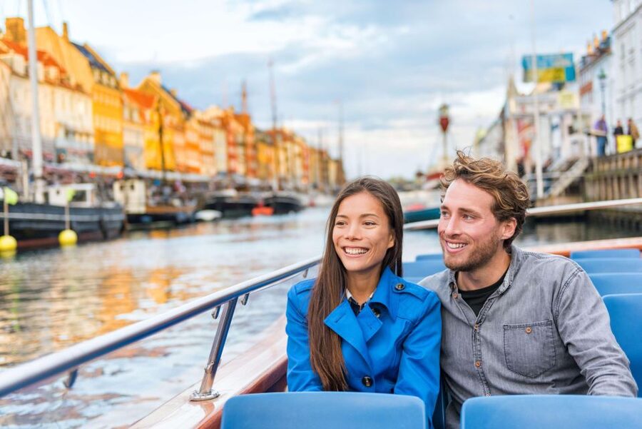 Copenhagen: Canal Boat Cruise & Old Town/Nyhavn Walking Tour - Nyhavn shifts the tour from streets to water