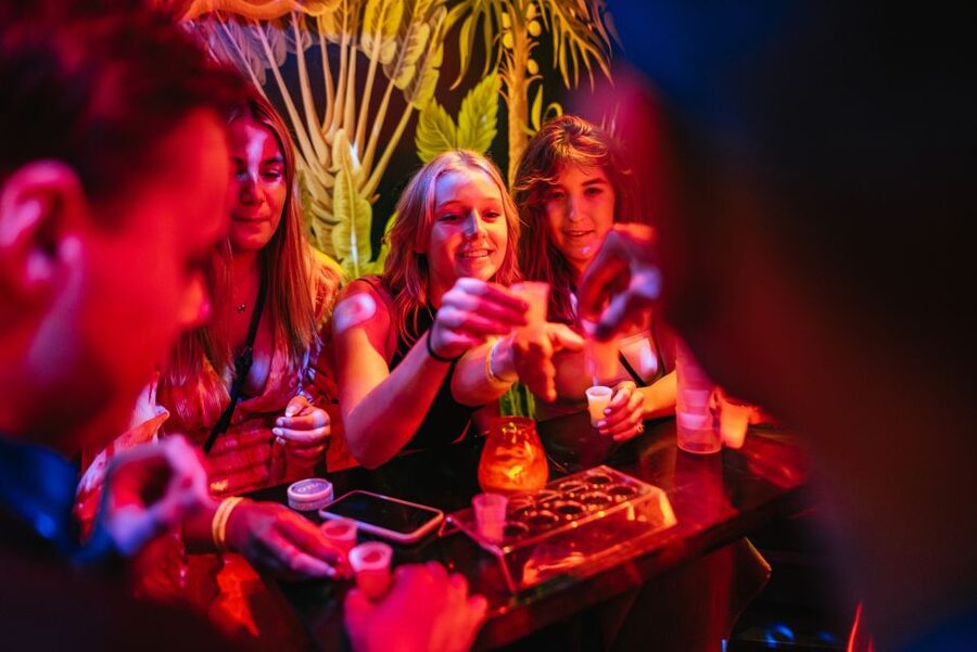 Copenhagen: Guided Party Pub Crawl with 4 Shots and 1 Drink - Walking through central Copenhagen after dark