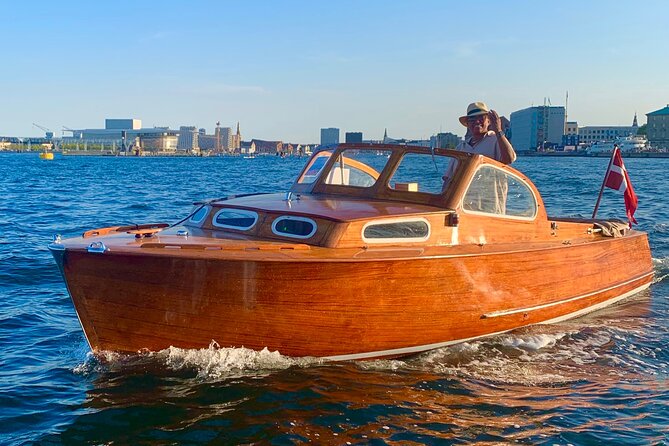 Private Copenhagen Boat cruise in Scandinavian mahogany boat - Parliament and the old Stock Exchange